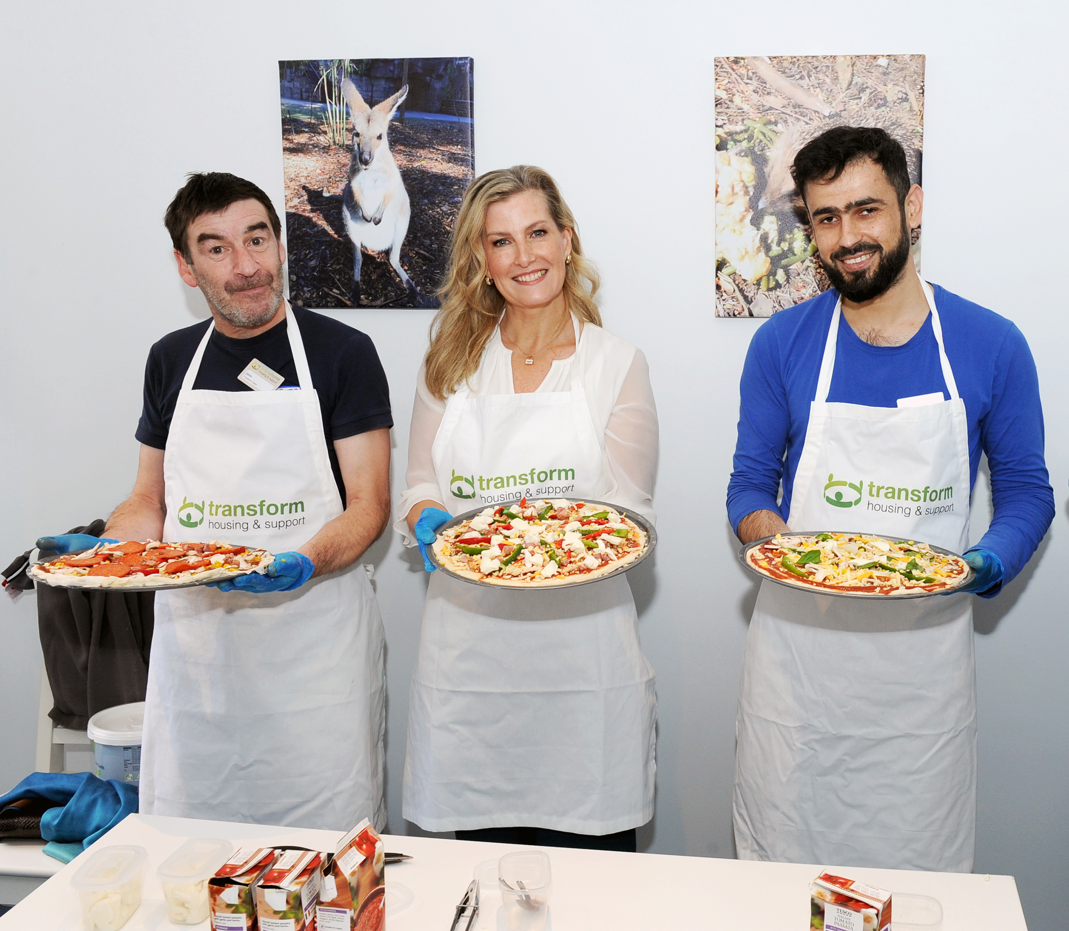 HRH The Countess of Wessex and two Transform clients making pizza